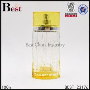 yellow clear oval perfume bottle with aluminum sprayer, yellow cap 100ml