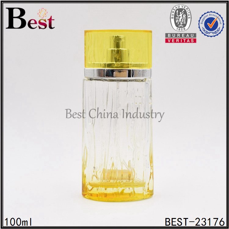 Wholesale 100% Original
 yellow clear oval perfume bottle with aluminum sprayer, yellow cap 100ml in Cairo