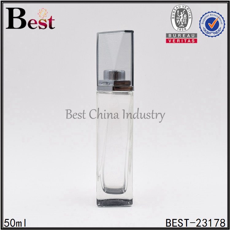 Factory source manufacturing
 clear square glass perfume bottle with special high cap 50ml  Supply to Nepal