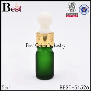 frosted green glass essential oil bottle with shiny gold dropper, big rubber head 5ml
