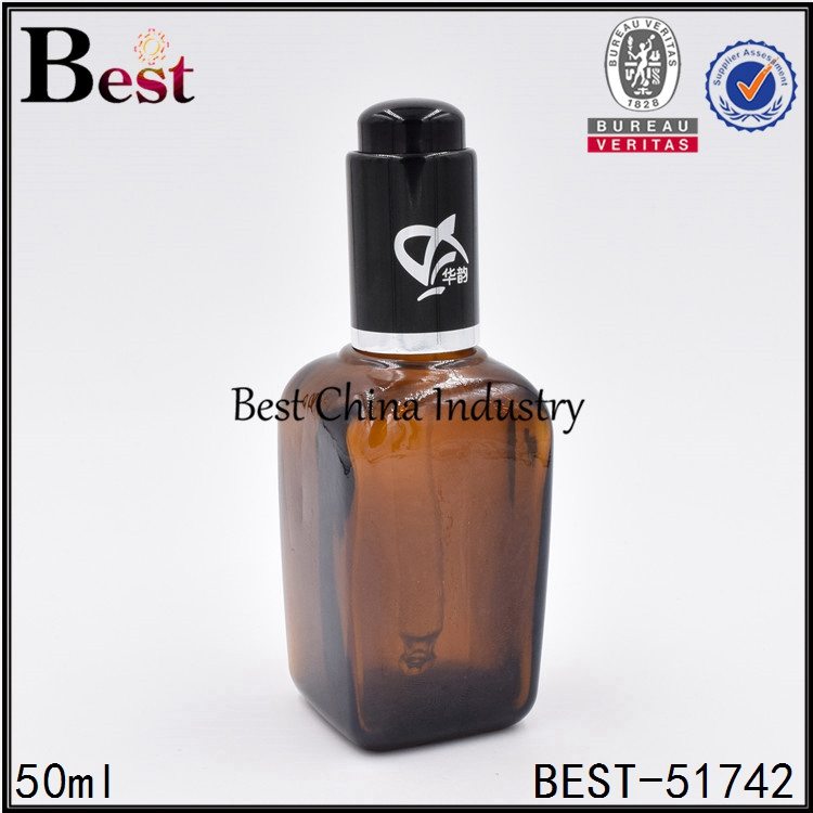 China supplier OEM
 empty cosmetic essential oil glass bottle with black press pump 50ml Manufacturer in Germany