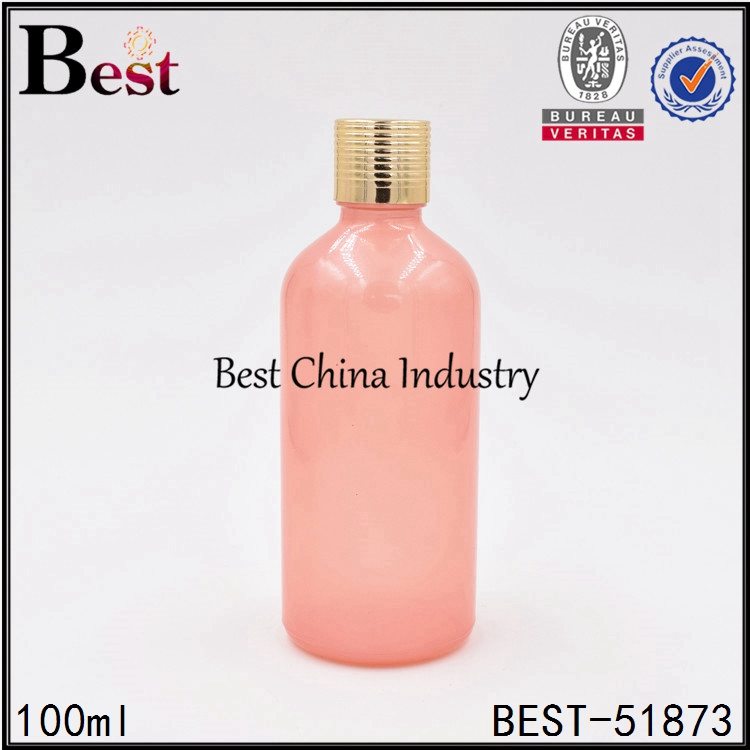 Low MOQ for
 pink color glass essential oil bottle with gold aluminum cap 100ml Factory in Jersey