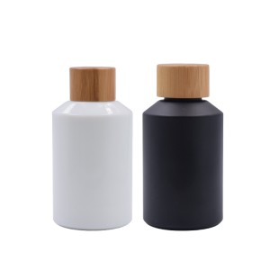 glass cosmetic bottle with bamboo cap